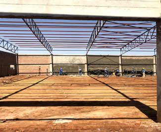 Roof steelwork and first-fix cabling in progress